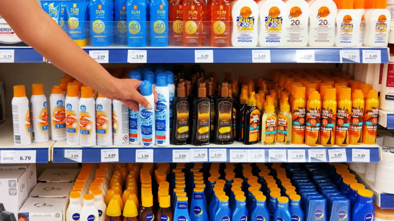 Sunscreens on store shelves.