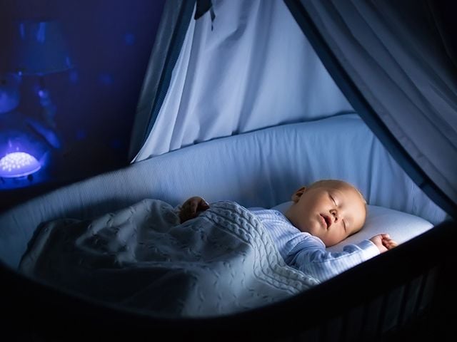 Sleeping baby in crib